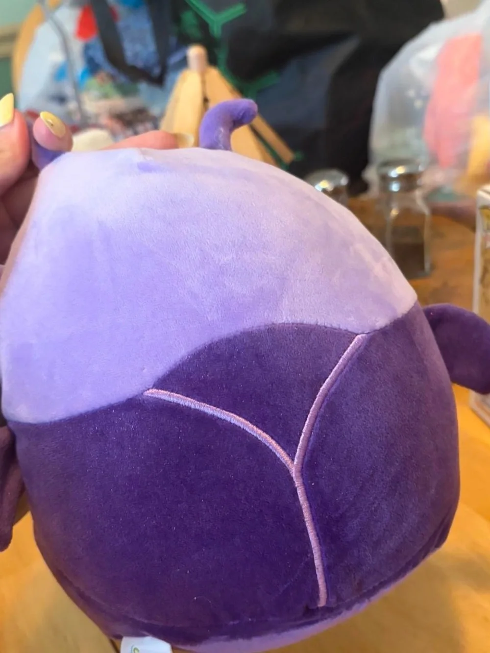 Squishmallows Purple and Cream Axel Plush Bug